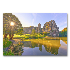 Premium Textil-Leinwand 90 x 60 cm Quer-Format Strahlendes Sonnenlicht und bezaubernde Spiegelung der Externsteine | Wandbild, HD-Bild auf Keilrahmen, Fertigbild auf hochwertigem Vlies, Leinwanddruck von Bettina Hackstein